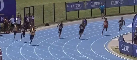 Athletics 400m race with athletes competing on the track