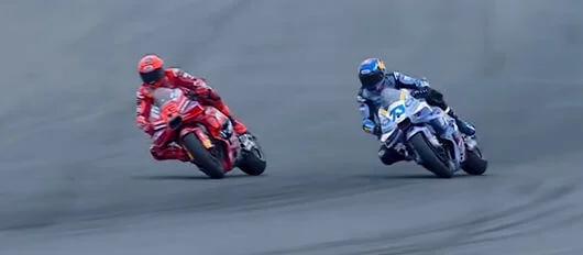 MotoGP race betting strategies, with drivers competing in a high-speed event